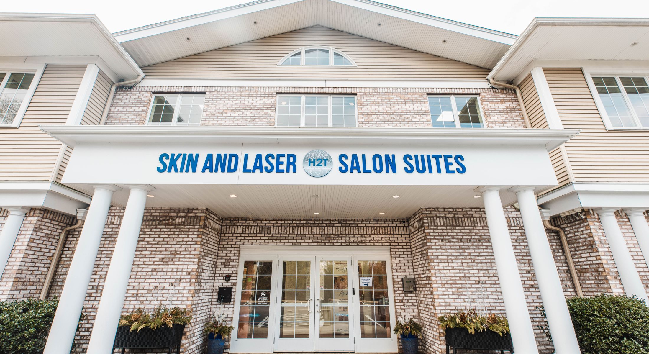 Skin and laser salon suites entrance exterior.
